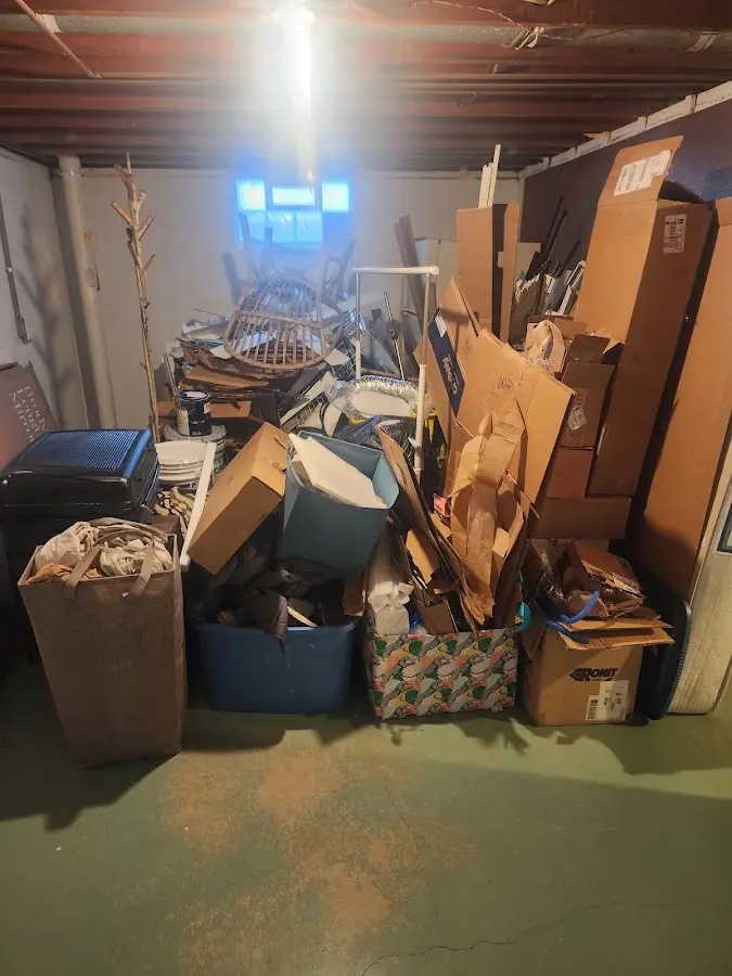 Roll-off dumpster container at job site for Construction Dumpster Rental in Hutto